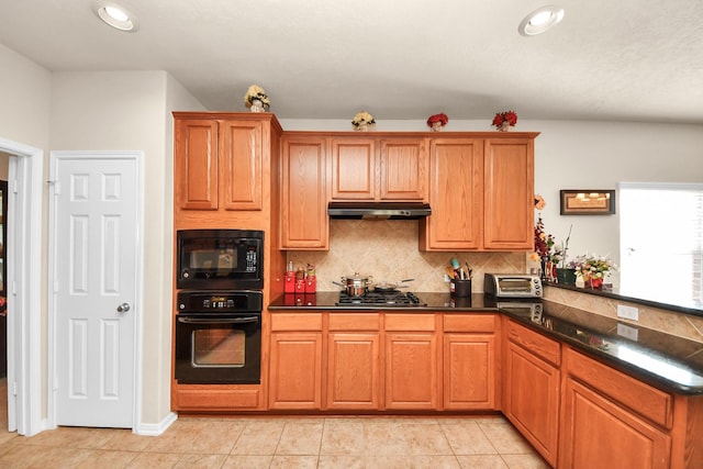 6723 Stableton Ln, Houston, TX 77049 - kitchen with black appliances, under cabinet range hood, decorative backsplash, light tile patterned floors, and brown cabinets