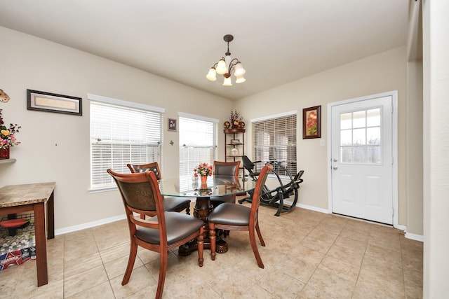 6723 Stableton Ln, Houston, TX 77049 - dining space featuring a chandelier, plenty of natural light, baseboards, and light tile patterned floors