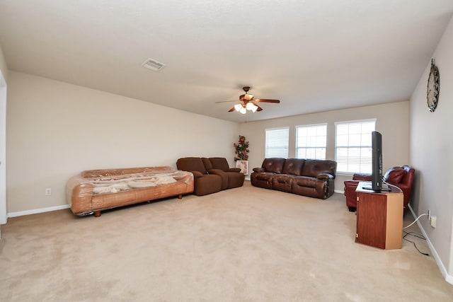 6723 Stableton Ln, Houston, TX 77049 - carpeted living room with a ceiling fan and baseboards