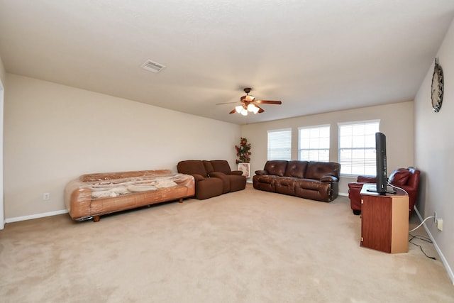 6723 Stableton Ln, Houston, TX 77049 - carpeted living room with ceiling fan and baseboards