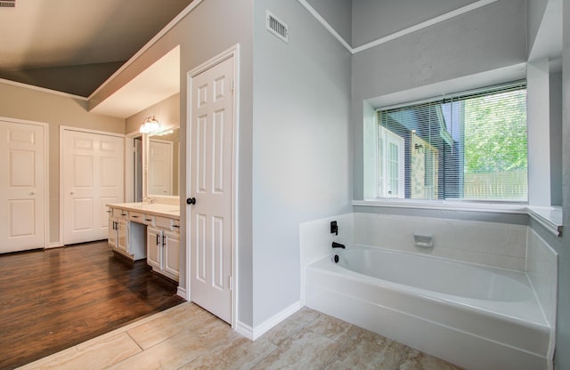 13215 Bunker Hill Dr, Willis, TX 77318 - full bathroom featuring vanity and a garden tub