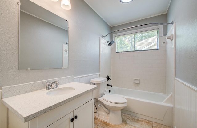 13215 Bunker Hill Dr, Willis, TX 77318 - bathroom with  shower combination, vanity, toilet, a wainscoted wall, and a textured wall