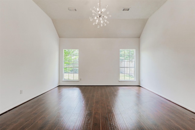 17935 Western Pass Ln, Houston, TX 77095 - empty room with lofted ceiling, a chandelier, wood finished floors, and baseboards