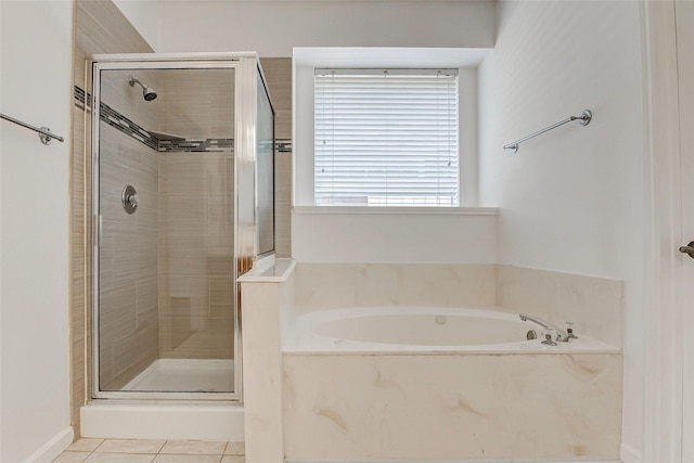 17935 Western Pass Ln, Houston, TX 77095 - full bath featuring a shower stall, a bath, and tile patterned floors