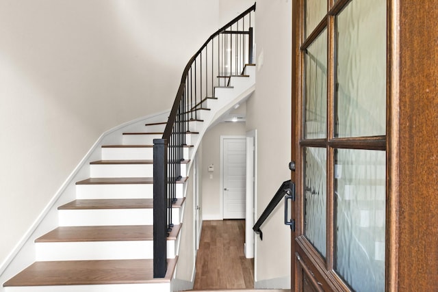 2653 Fountain Key Blvd, Houston, TX 77008 - staircase featuring wood finished floors and a high ceiling