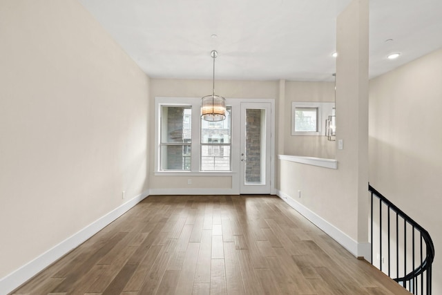 2653 Fountain Key Blvd, Houston, TX 77008 - unfurnished dining area featuring baseboards, a chandelier, wood finished floors, and recessed lighting