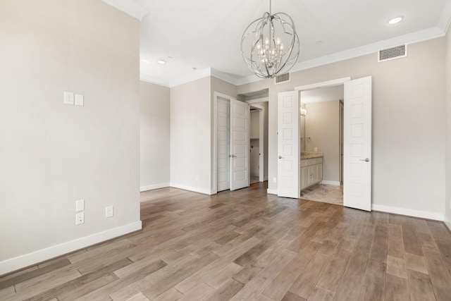 2653 Fountain Key Blvd, Houston, TX 77008 - empty room featuring a chandelier, baseboards, light wood-style floors, ornamental molding, and recessed lighting