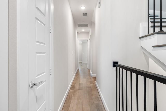 2653 Fountain Key Blvd, Houston, TX 77008 - hallway featuring wood finished floors, baseboards, and recessed lighting