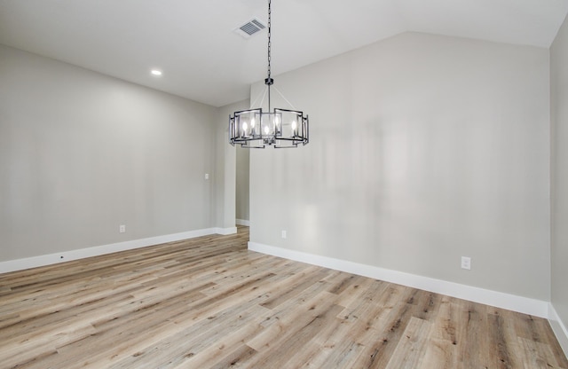 4506 Knights Ct, Baytown, TX 77521 - unfurnished dining area featuring a chandelier, wood finished floors, recessed lighting, baseboards, and lofted ceiling
