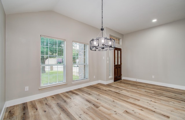 4506 Knights Ct, Baytown, TX 77521 - unfurnished dining area with a chandelier, wood finished floors, baseboards, vaulted ceiling, and recessed lighting