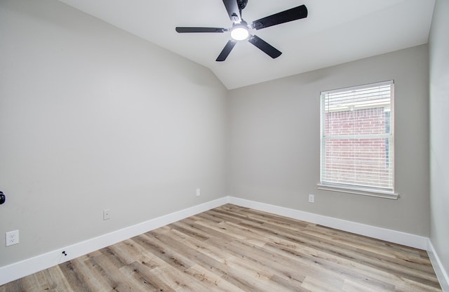 4506 Knights Ct, Baytown, TX 77521 - empty room with vaulted ceiling, wood finished floors, baseboards, and a ceiling fan