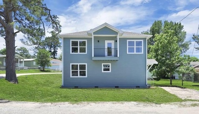189 W Lakeview Wood, Onalaska, TX 77360 - view of property exterior featuring crawl space, a balcony, and a yard
