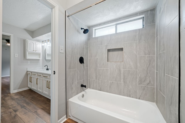 801 Thornwood Dr, Shenandoah, TX 77381 - full bath with a textured ceiling, vanity, shower / bath combination, wood finished floors, and baseboards