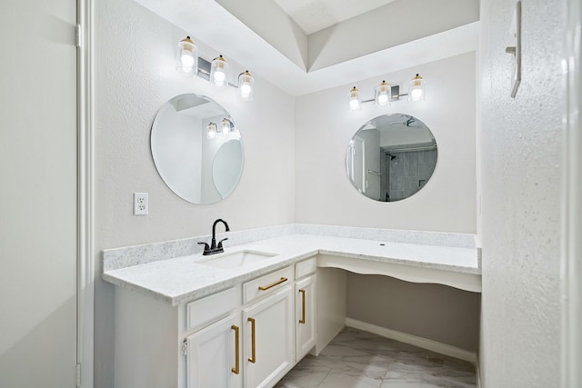 801 Thornwood Dr, Shenandoah, TX 77381 - bathroom featuring marble look tile flooring, vanity, and baseboards