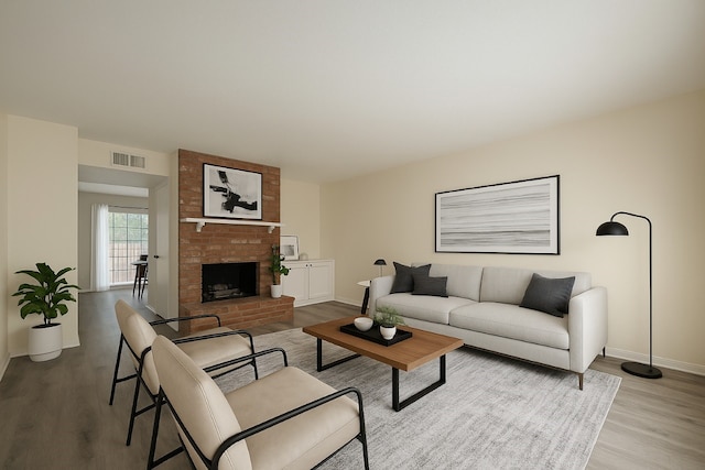 3968 Belle Park Dr, Houston, TX 77072 - living room featuring wood finished floors, baseboards, and a brick fireplace
