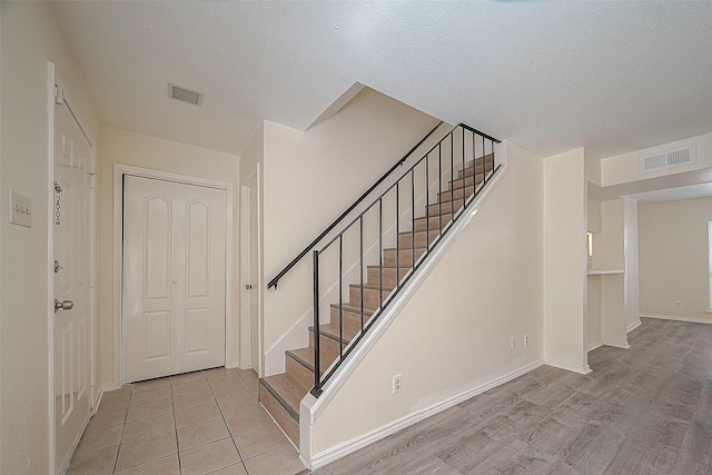 3968 Belle Park Dr, Houston, TX 77072 - staircase featuring baseboards and wood finished floors