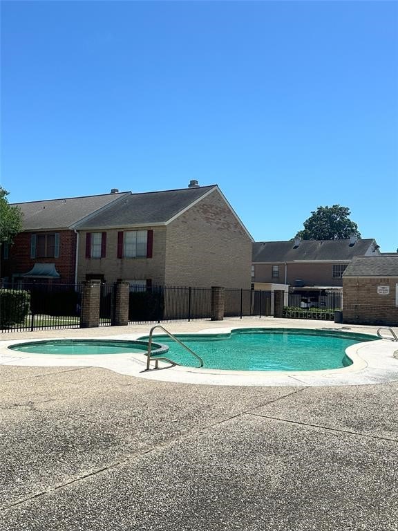 3968 Belle Park Dr, Houston, TX 77072 - community pool with a patio area