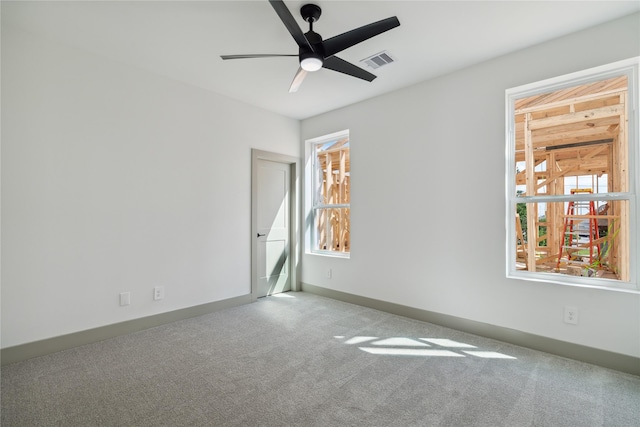 2949 Delafield St, Houston, TX 77023 - carpeted spare room with healthy amount of natural light, a ceiling fan, and baseboards
