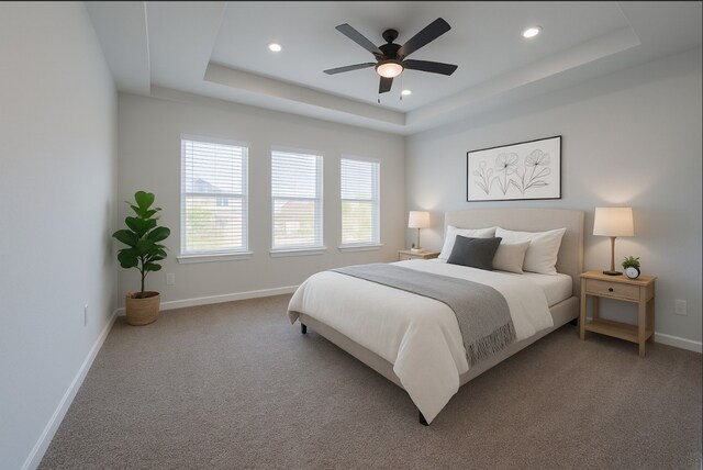318 New Hampshire St, Houston, TX 77029 - bedroom with a tray ceiling, recessed lighting, baseboards, carpet floors, and a ceiling fan