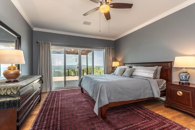 1328 Lakepark Dr, Lakehills, TX 78063 - bedroom featuring access to outside, wood finished floors, crown molding, and ceiling fan