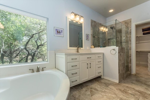 1328 Lakepark Dr, Lakehills, TX 78063 - bathroom with a stall shower, vanity, a garden tub, and healthy amount of natural light