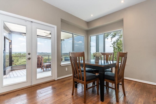 1328 Lakepark Dr, Lakehills, TX 78063 - dining room featuring hardwood / wood-style floors, baseboards, and french doors