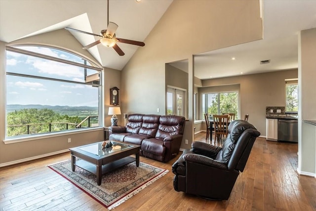1328 Lakepark Dr, Lakehills, TX 78063 - living room featuring ceiling fan, hardwood / wood-style flooring, high vaulted ceiling, and recessed lighting