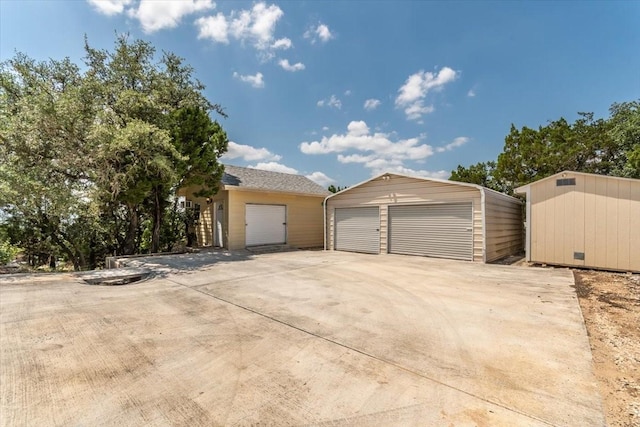 1328 Lakepark Dr, Lakehills, TX 78063 - view of front of property featuring an outbuilding and a detached garage