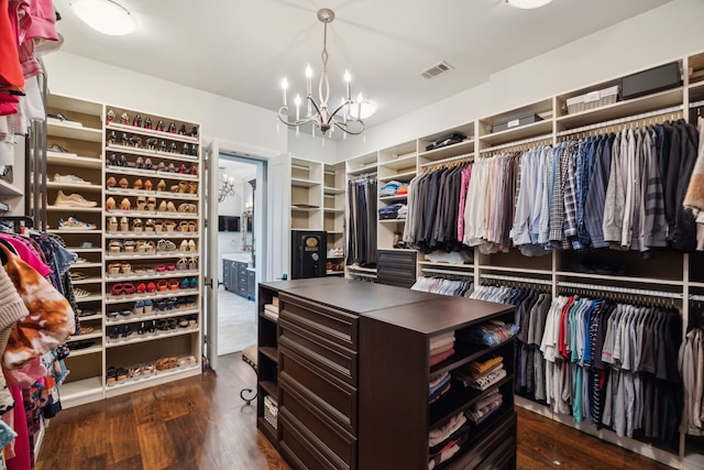 5659 Willers Way, Houston, TX 77056 - spacious closet with a chandelier and wood finished floors