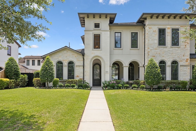 5659 Willers Way, Houston, TX 77056 - view of front of property with stone siding, a front yard, and stucco siding