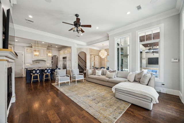 5659 Willers Way, Houston, TX 77056 - living area featuring ceiling fan, a fireplace, arched walkways, dark wood-type flooring, and recessed lighting