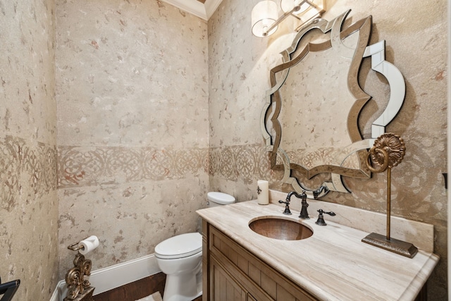 5659 Willers Way, Houston, TX 77056 - bathroom featuring vanity, crown molding, toilet, and wood finished floors