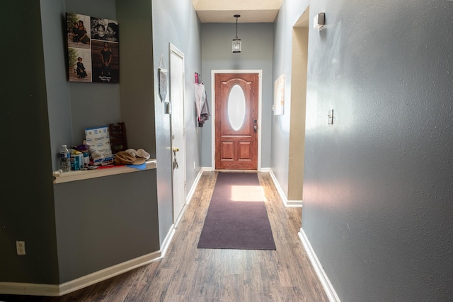 3906 Cyril Dr, Humble, TX 77396 - entryway with wood finished floors and baseboards