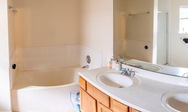 3906 Cyril Dr, Humble, TX 77396 - full bath featuring a garden tub, double vanity, and a shower