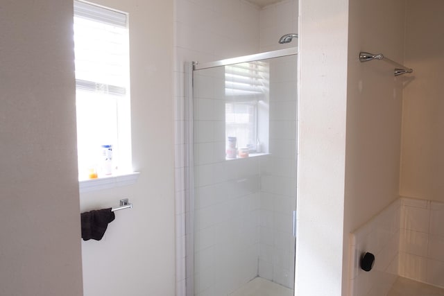 3906 Cyril Dr, Humble, TX 77396 - full bathroom featuring plenty of natural light and a stall shower
