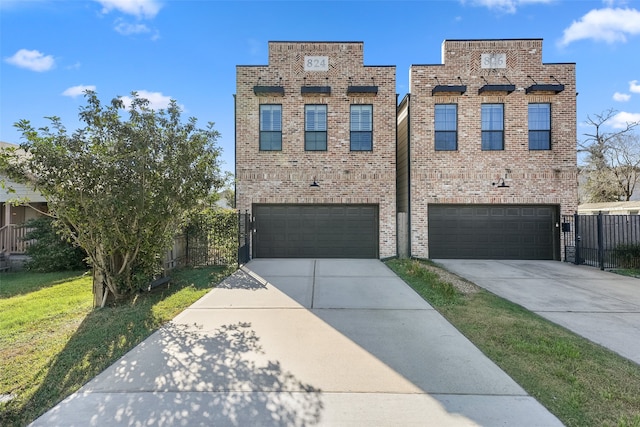 824 W 20th St, Houston, TX 77008 - view of front of property featuring a garage, concrete driveway, and brick siding