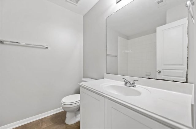 17439 Hayley Springs Ct, Humble, TX 77396 - full bathroom featuring toilet, vanity, baseboards, and tile patterned floors