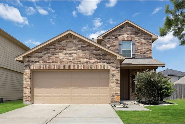 17439 Hayley Springs Ct, Humble, TX 77396 - view of front of house with driveway, brick siding, and an attached garage