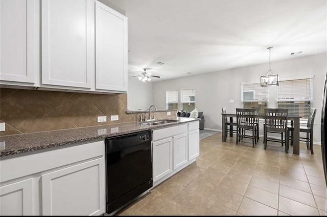 17439 Hayley Springs Ct, Humble, TX 77396 - kitchen featuring dishwasher, a sink, tasteful backsplash, ceiling fan, and white cabinetry