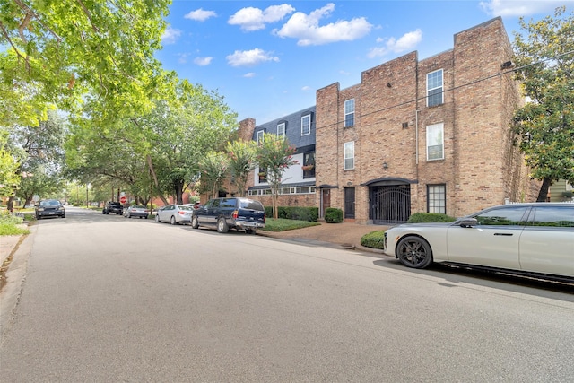 1909 Brun St Unit 17, Houston, TX 77019 - view of asphalt street featuring curbs and sidewalks
