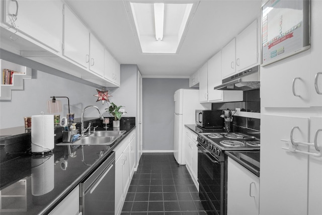 1909 Brun St Unit 17, Houston, TX 77019 - kitchen with black appliances, under cabinet range hood, a sink, dark countertops, and dark tile patterned floors