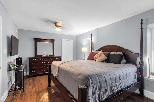 1909 Brun St Unit 17, Houston, TX 77019 - bedroom with wood finished floors, baseboards, and ceiling fan