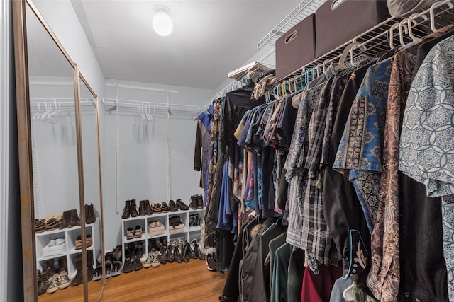1909 Brun St Unit 17, Houston, TX 77019 - walk in closet featuring wood finished floors