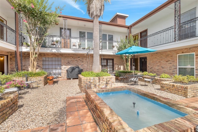 1909 Brun St Unit 17, Houston, TX 77019 - view of pool featuring a patio, area for grilling, and a pool
