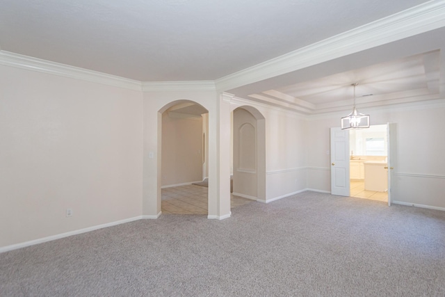 2415 Blue Shadow Dr, Spring, TX 77388 - carpeted spare room featuring ornamental molding, arched walkways, baseboards, a chandelier, and a tray ceiling