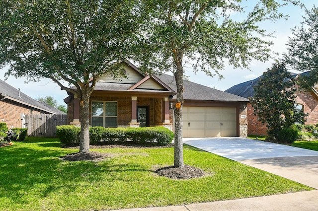 19527 Sundance Edge Ct, Richmond, TX 77407 - view of front of property with brick siding, an attached garage, and driveway