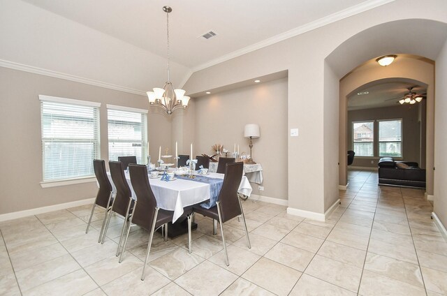 19527 Sundance Edge Ct, Richmond, TX 77407 - dining space featuring ornamental molding, a chandelier, light tile patterned floors, arched walkways, and baseboards
