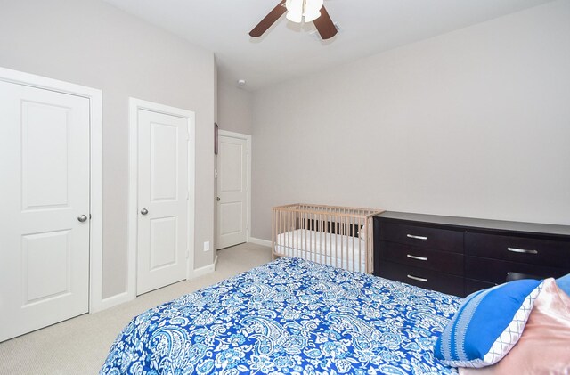 19527 Sundance Edge Ct, Richmond, TX 77407 - bedroom with carpet flooring, baseboards, and a ceiling fan