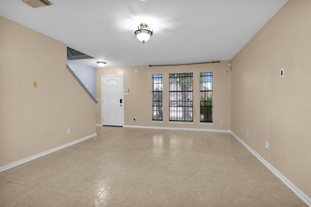 11539 Byronstone Dr, Houston, TX 77066 - foyer entrance featuring baseboards and light tile patterned floors