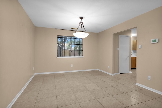 11539 Byronstone Dr, Houston, TX 77066 - unfurnished room with baseboards and light tile patterned floors